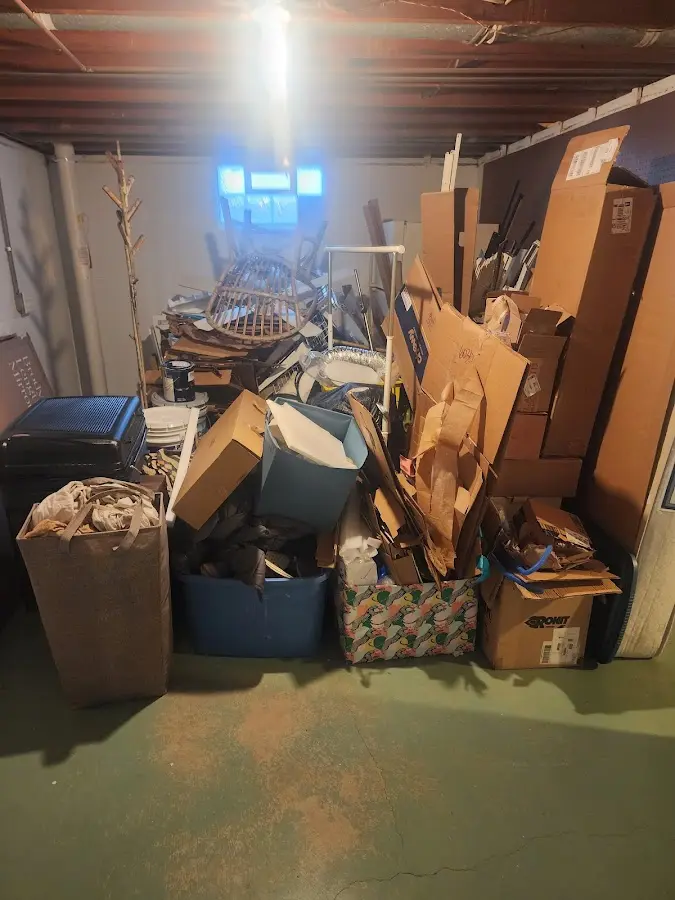 Roll-off dumpster container at job site for Roll Off Dumpster Rental in Green